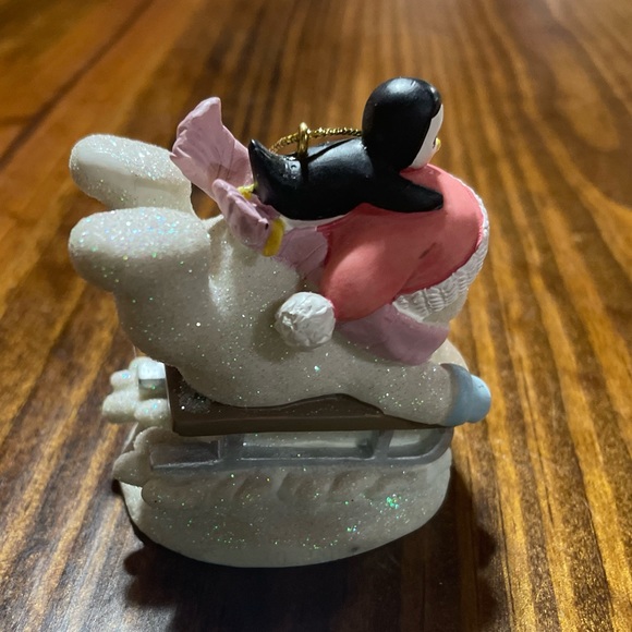 Vintage child snowman sledding snowman with baby penguin ornament. - Picture 3 of 4